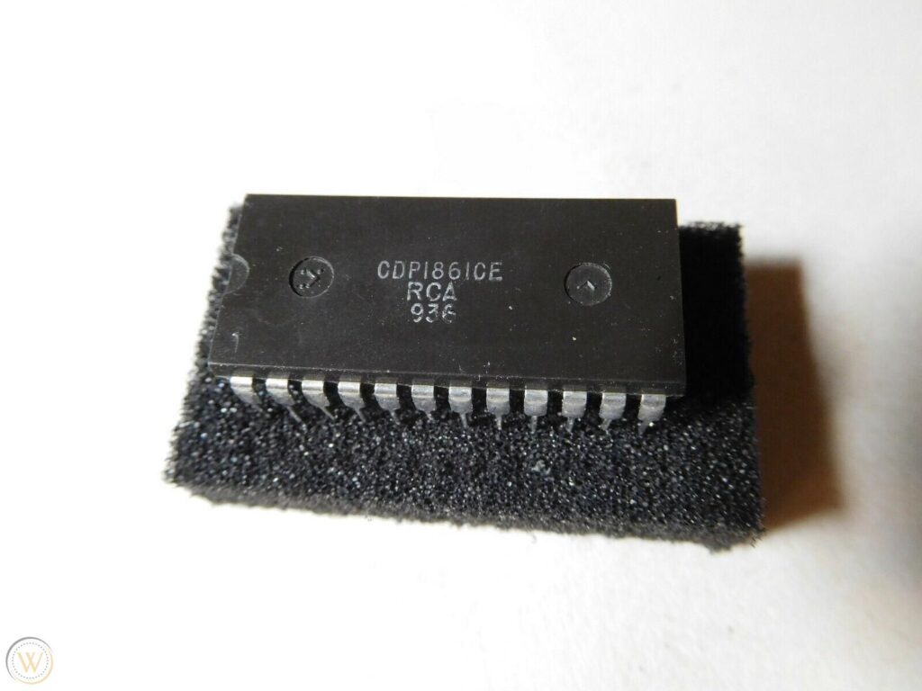 An RCA CDP1861 Pixie video chip lying on a Styrofoam pad.